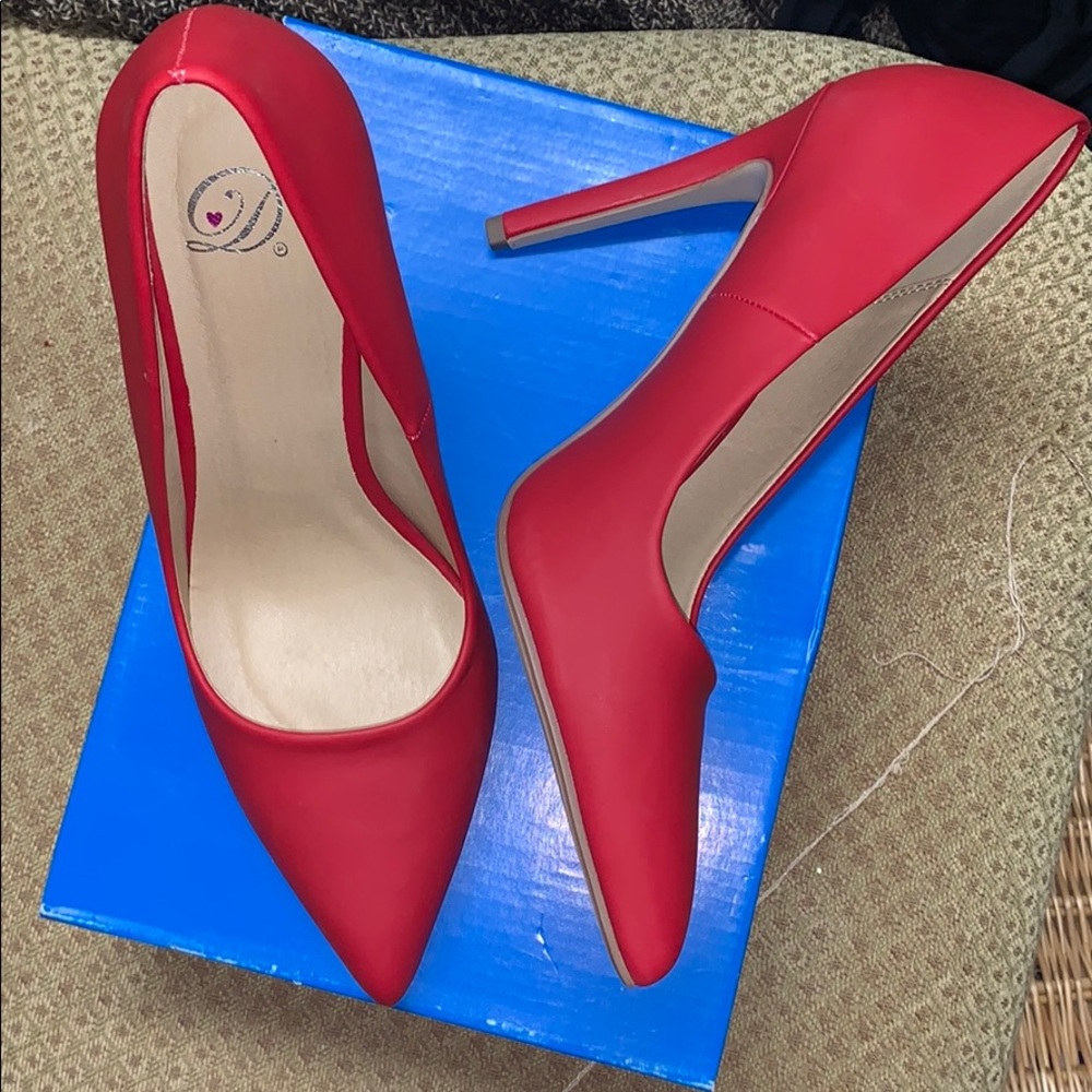 Brand new red heels